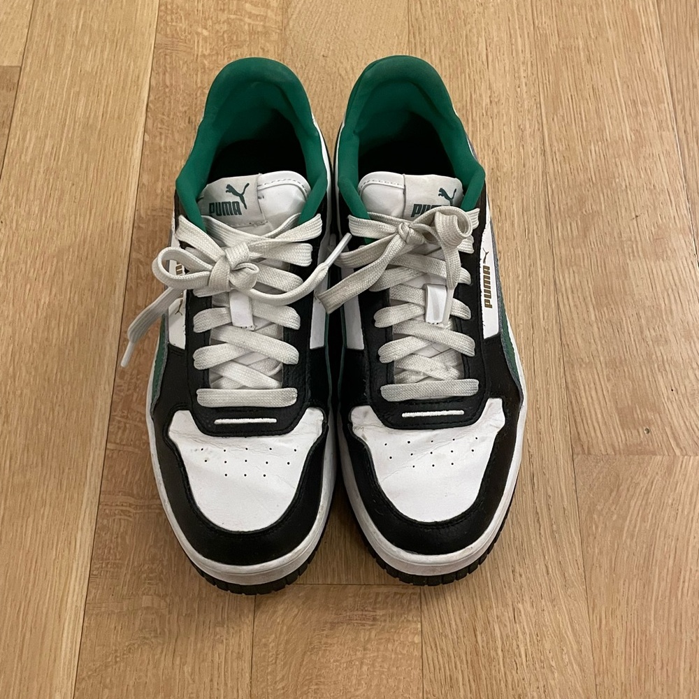Green, black and white puma sneakers